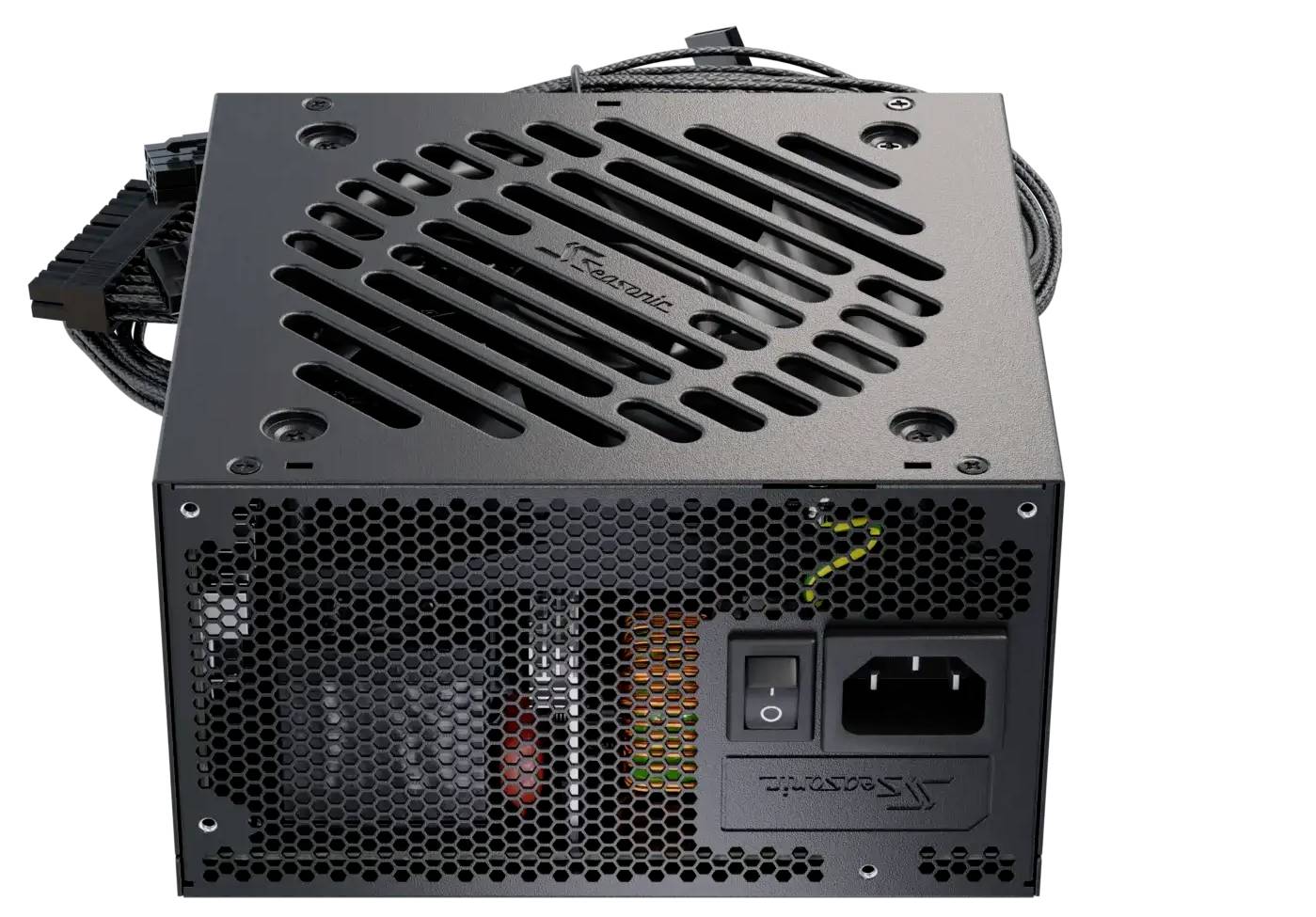 Une unité d'alimentation électrique pour ordinateur avec un ventilateur de refroidissement, un interrupteur marche/arrêt et des connecteurs de câbles, conçue pour une utilisation sur un bureau.