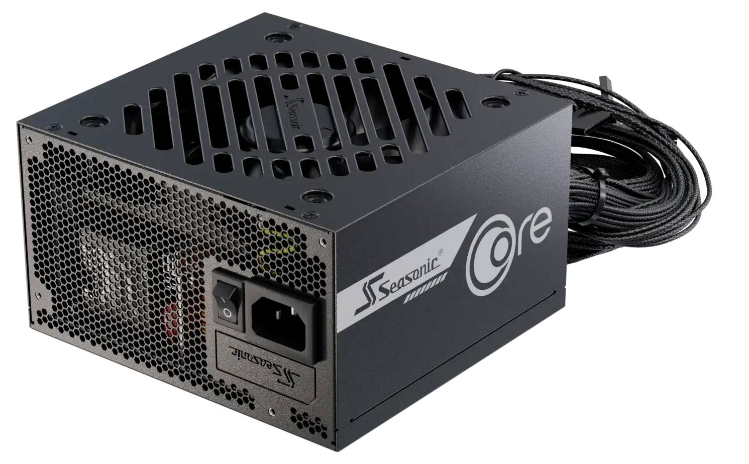 Bloc d'alimentation 'Seasonic Core' avec un boîtier noir, une grille de ventilation apparente et des câbles attachés, conçu pour les ordinateurs de bureau.
