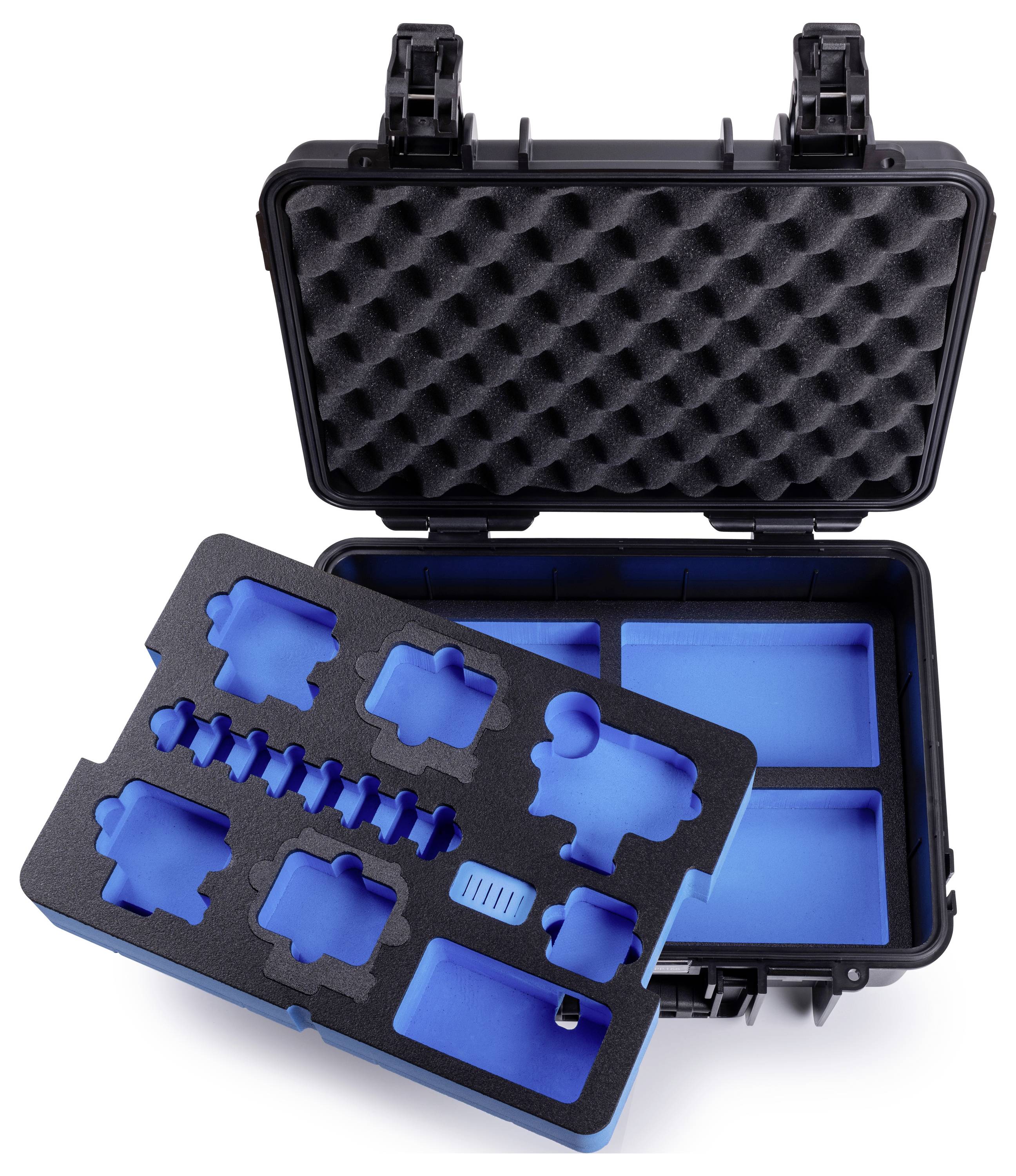Un étui de protection noir avec des insertions en mousse bleue et des découpes pour maintenir solidement divers outils ou équipements. Le couvercle du boîtier est ouvert.