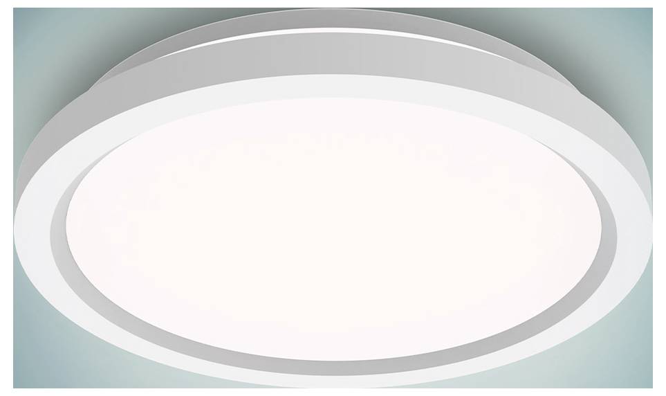 Un luminaire de plafond circulaire en LED blanc, au design moderne, diffusant une lueur douce sur un fond bleu-vert.