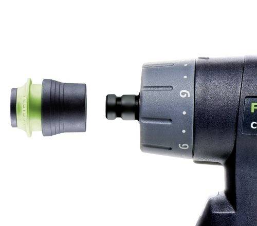 Un gros plan d'une perceuse avec un accessoire, mettant l'accent sur le mécanisme d'échange du foret. La perceuse présente des réglages visibles de 1 à 9.