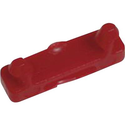 Un morceau de plastique rouge avec deux extrémités surélevées, ressemblant à un petit bloc rectangulaire.