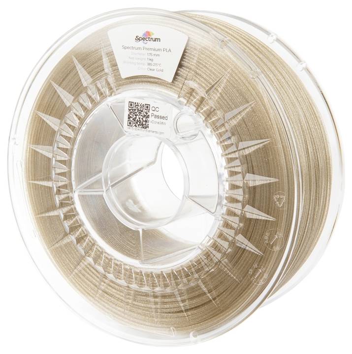 Un rouleau de filament PLA Premium Spectrum de couleur or transparent. Le filament est soigneusement enroulé à l'intérieur d'une bobine en plastique transparent.
