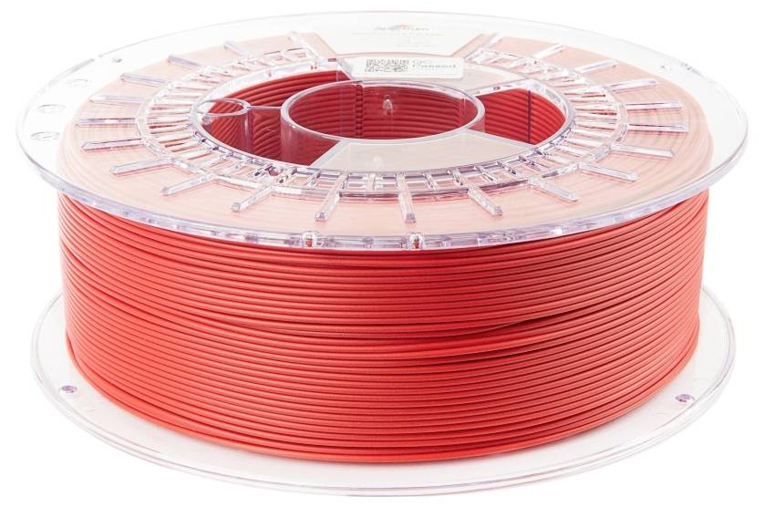 Une bobine de filament rouge pour impression 3D, soigneusement enroulée dans un dévidoir en plastique transparent, sur un fond blanc.