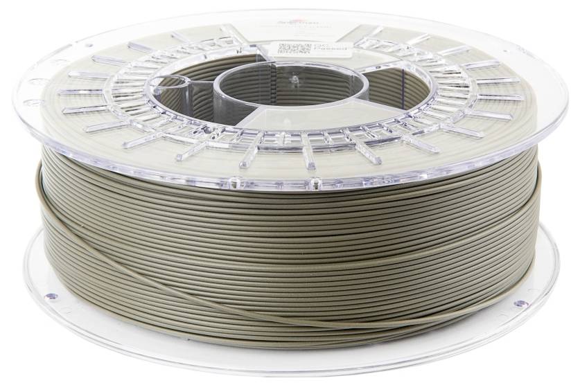 Un bobineau transparent de filament, vraisemblablement utilisé pour l'impression 3D, enroulé avec un matériau de couleur brun clair. Le bobineau est cylindrique et transparent.