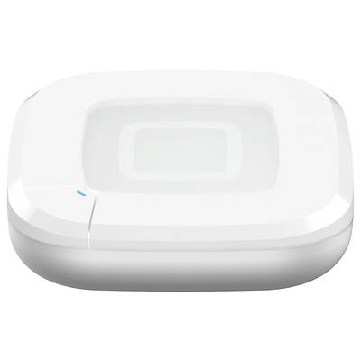 Un appareil électronique rectangulaire blanc avec un petit voyant lumineux bleu, probablement un hub ou un routeur, vu sous une perspective angulaire de dessus.