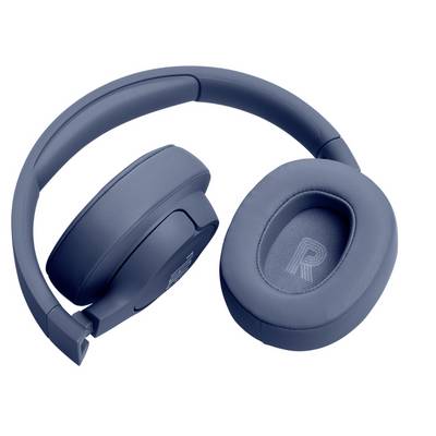 Casque audio bleu surdimensionné, portant l'étiquette « R » à l'intérieur de l'écouteur droit, posé sur une surface blanche.