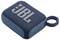 Un haut-parleur portable compact bleu avec le logo 'JBL' sur le dessus et une poignée en boucle, conçu pour une utilisation mobile.