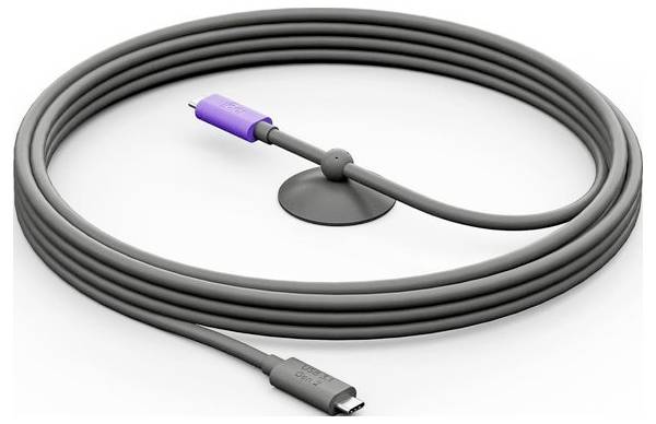 Un long câble USB gris avec un connecteur violet et une ventouse, conçu pour maintenir le câble organisé et fixé sur différentes surfaces.