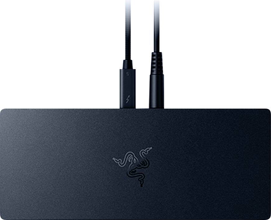 Un appareil noir avec un logo stylisé et deux câbles branchés, dont un avec un symbole de foudre, suggérant un concentrateur de charge ou de connectivité.