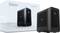 'Mini PC ZOTAC ZBOX Magnus One présenté à côté de son emballage, mettant en valeur sa taille compacte et son design élégant.'