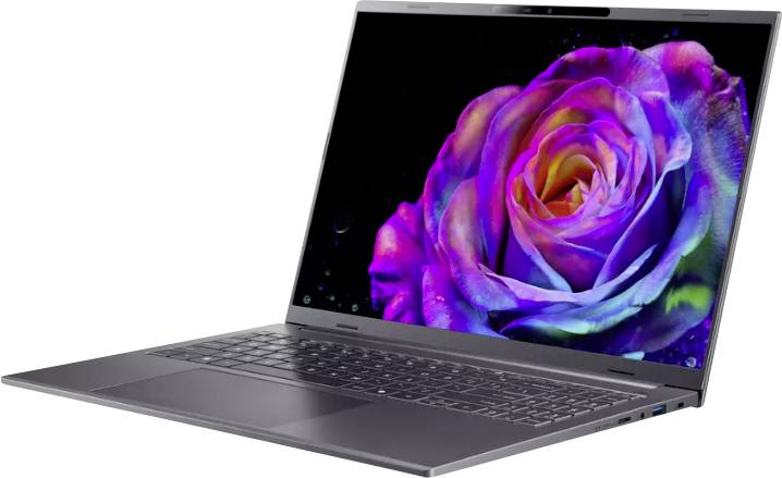 Un ordinateur portable élégant affichant une rose vibrante et colorée sur son écran, mettant en valeur ses capacités d'affichage haute résolution.