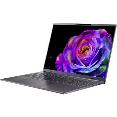 Un ordinateur portable élégant affichant une rose vibrante et colorée sur son écran, mettant en valeur ses capacités d'affichage haute résolution.