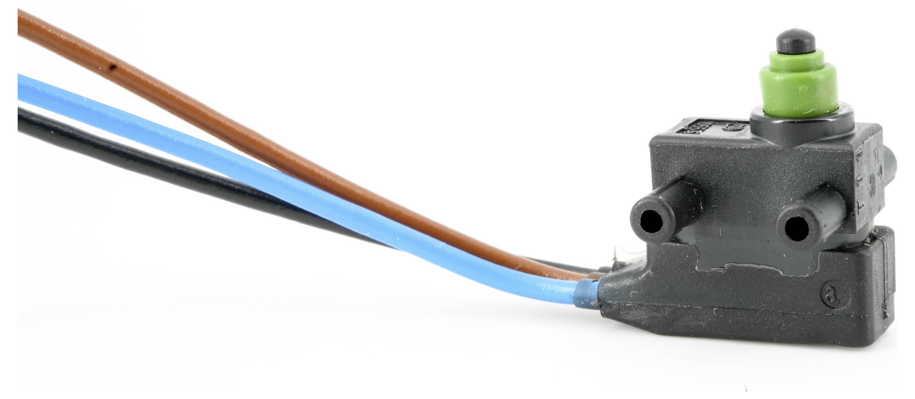 Un petit actionneur de vanne noir avec un capuchon vert et trois fils attachés : marron, bleu et noir.