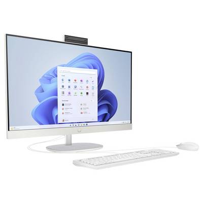 Un ordinateur de bureau moderne avec un écran large affichant l'écran d'accueil du système d'exploitation Windows, accompagné d'un clavier blanc et d'une souris.