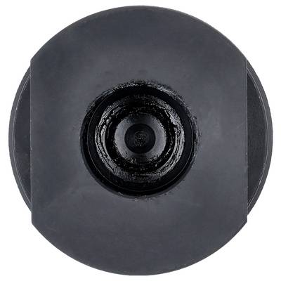 Un objet circulaire noir avec un disque central surélevé et un anneau extérieur en creux, ressemblant à un composant mécanique ou industriel.