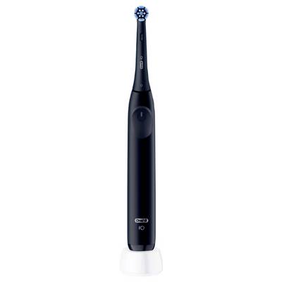 Une brosse à dents électrique noire avec une petite tête de brosse circulaire, posée sur un support de charge blanc.