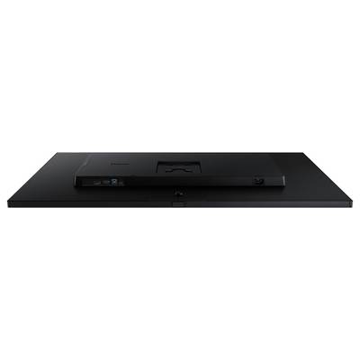 Vue arrière d'un moniteur d'ordinateur plat et noir, avec support de montage visible et ports d'entrée sur le panneau inférieur.