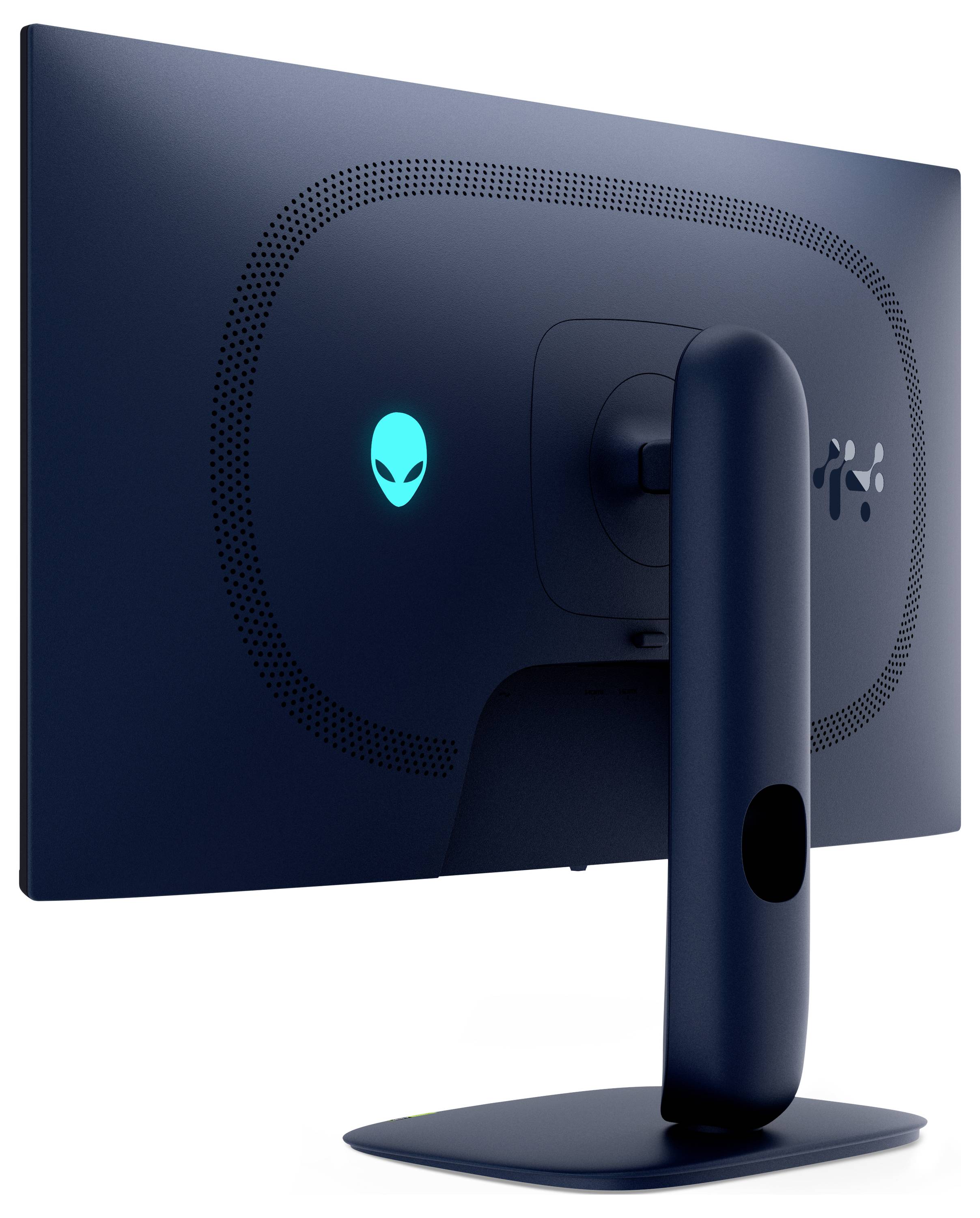 Un écran d'ordinateur bleu foncé vu de dos avec un logo extraterrestre illuminé et un support robuste, évocateur d'un environnement de jeu.