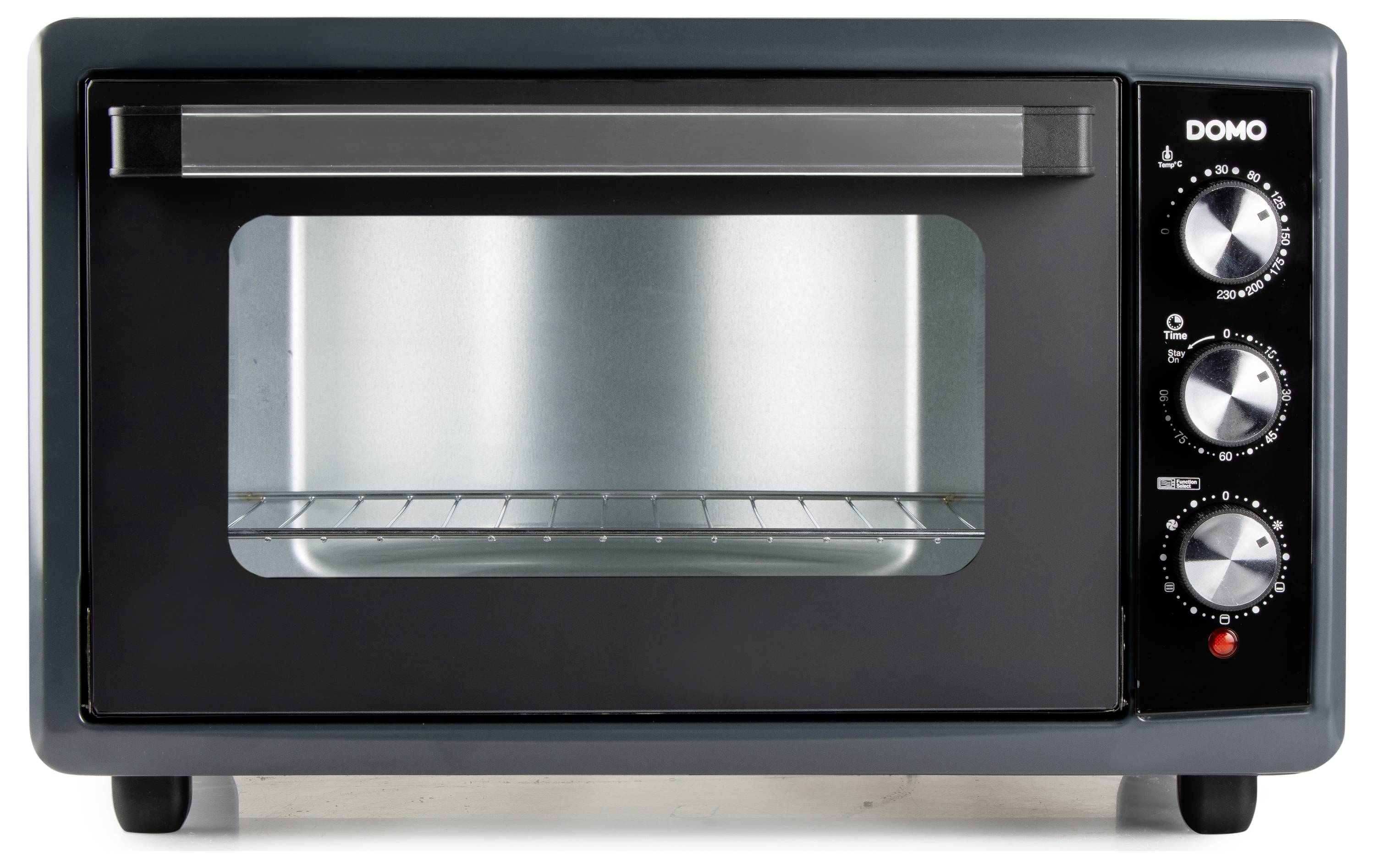 Un four de comptoir compact avec une porte transparente et trois boutons de commande sur la droite, étiquetés avec des réglages de température et une minuterie.