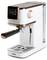 Une machine à espresso blanche avec une buse à vapeur, des commandes numériques et un réservoir d'eau amovible, portant l'étiquette 'DOMO' à sa base.