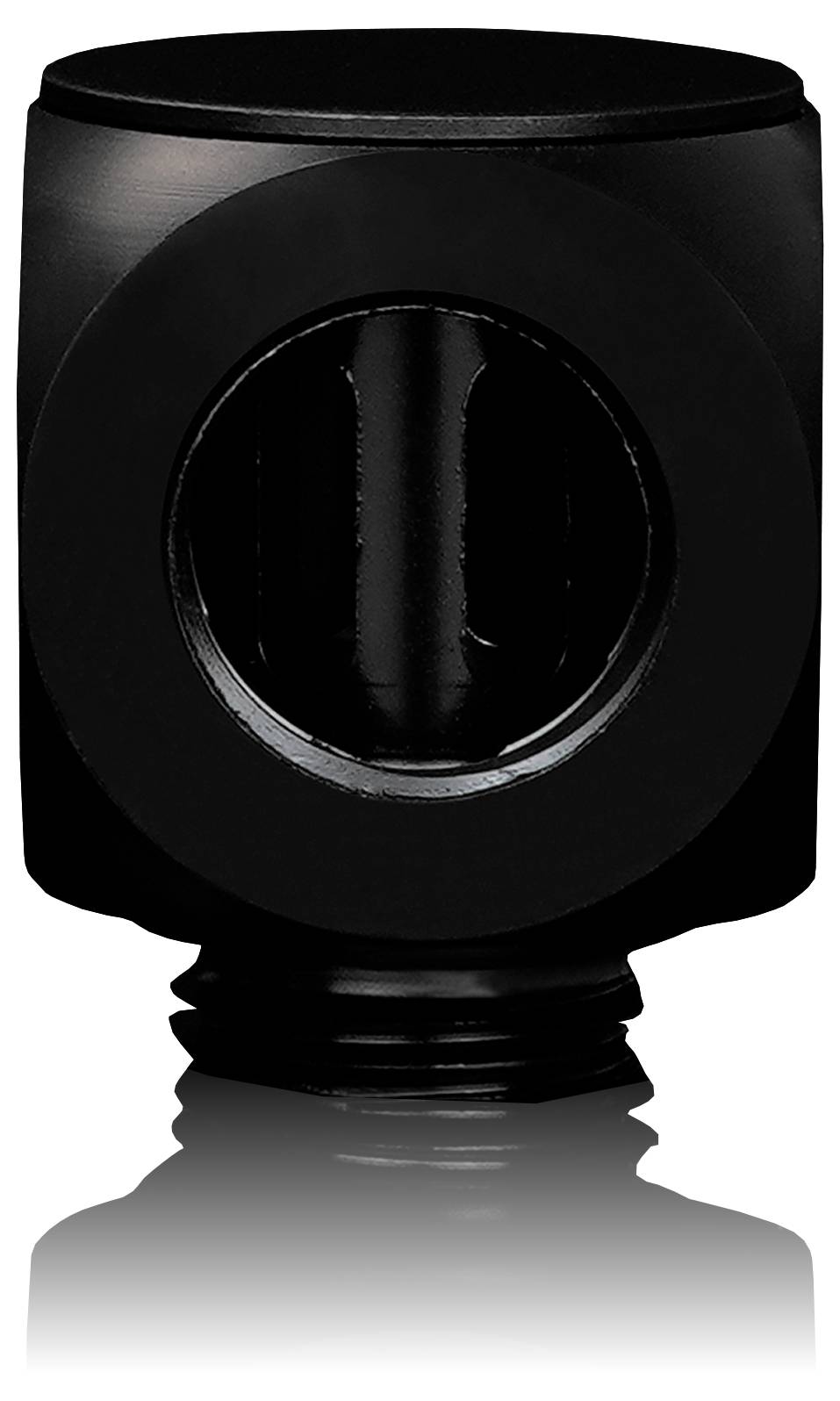 Un adaptateur d'objectif de caméra cylindrique noir avec une découpe circulaire, révélant des éléments de verre internes, placé sur une surface réfléchissante.