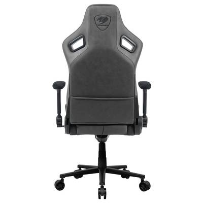 Une chaise de jeu noire avec accoudoirs et un dossier haut arborant un emblème au dos.