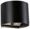Un lampadaire mural noir cylindrique au design minimaliste, doté d'une source lumineuse dirigée vers le bas.