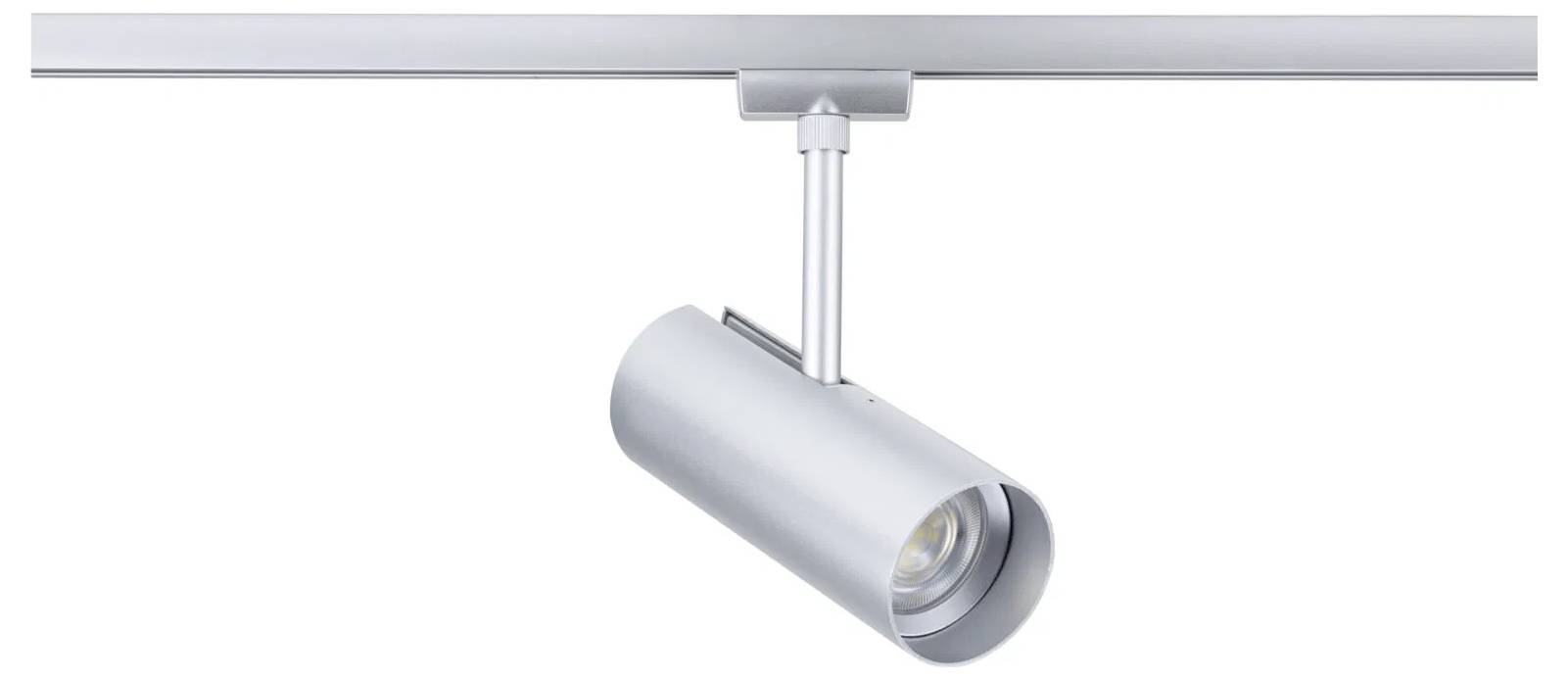 Un luminaire moderne de type projecteur linéaire cylindrique en argent est monté sur un rail métallique. La tête du luminaire est ajustable pour un éclairage directionnel.