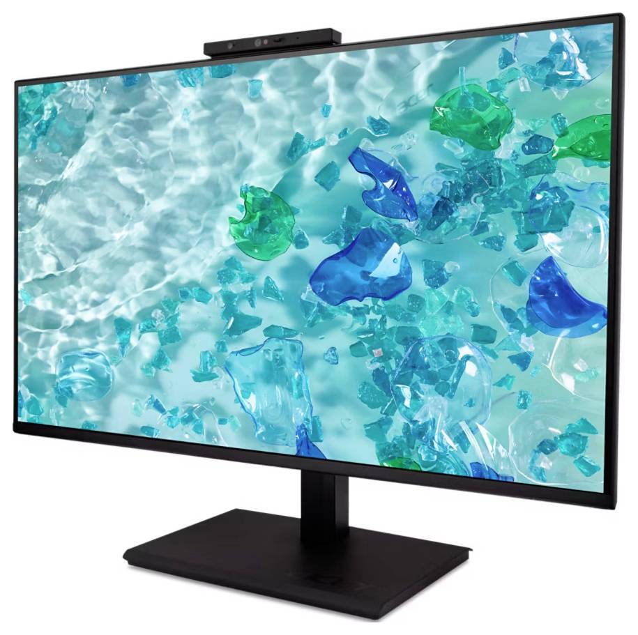 Un écran d'ordinateur affichant un motif abstrait vibrant aux teintes d'aqua et de vert, présentant des formes translucides et réfléchissant la lumière comme de l'eau.