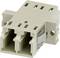 Un connecteur électrique beige doté de deux ports étiquetés « A » et « B », conçu pour sécuriser et organiser les connexions de fils.