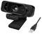 Une webcam noire avec port USB, portant l'étiquette « FHD 1080p » sur sa façade avant, équipée d'un objectif et d'un microphone. Elle se connecte via un câble USB visible à côté d'elle.