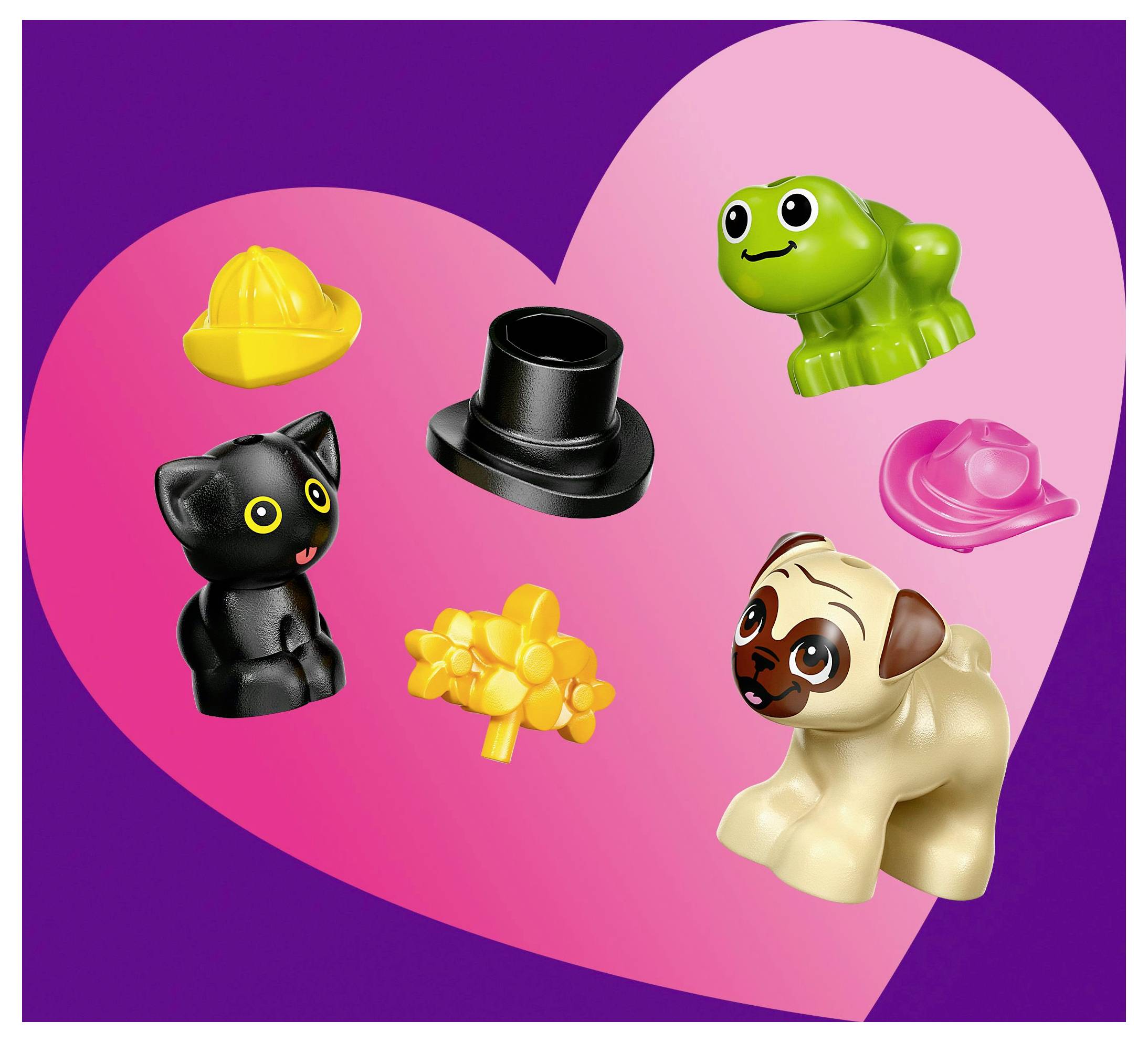 Un arrière-plan en forme de cœur présente des animaux en peluche, dont un chat noir, une grenouille verte et un chien brun, avec des chapeaux et des accessoires éparpillés.