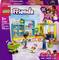 Ensemble LEGO Friends représentant un mini-supermarché de Heartlake City avec des personnages faisant leurs courses. Comprend des étagères, une caisse, et un chariot.