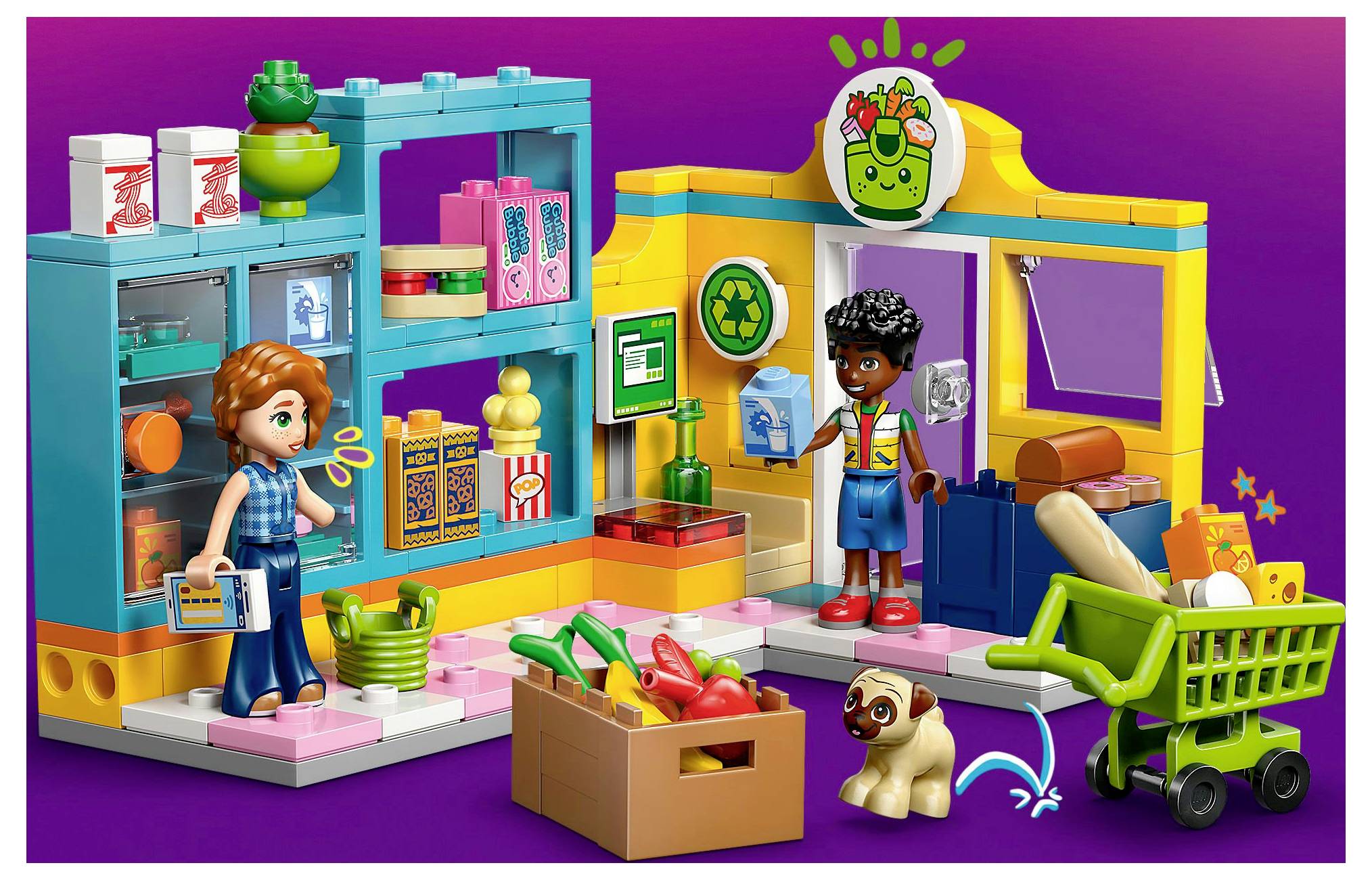Deux enfants jouent dans un supermarché de jouets coloré avec un chariot, des produits frais et un chien enjoué. Un fond violet vif rehausse la scène.