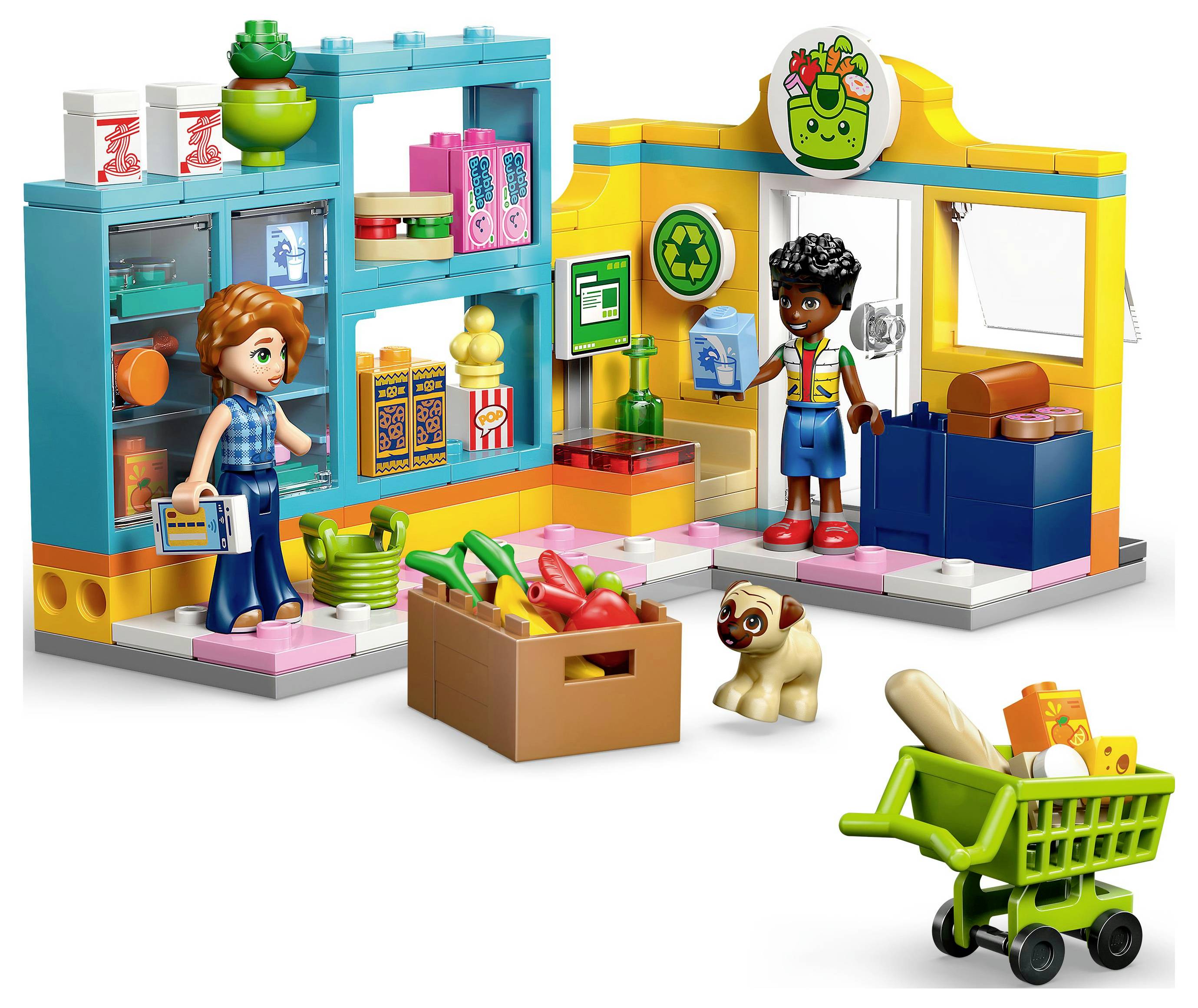 Ensemble de jeu de magasin de jouets avec figurines, produits d'épicerie et thème du recyclage. Deux enfants jouent avec une caisse enregistreuse et un chariot de courses.