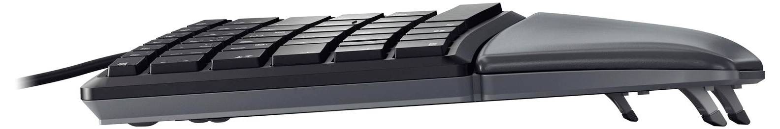 Clavier placé latéralement avec des touches surélevées et un design ergonomique. Connexion filaire visible sur le côté gauche.