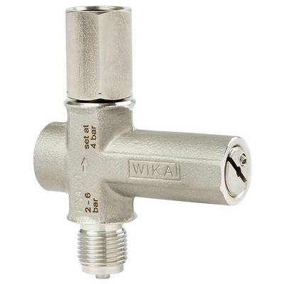 Une vanne de décharge de pression WIKA en argent réglée à 4 bars, adaptée aux pressions comprises entre 2 et 6 bars.