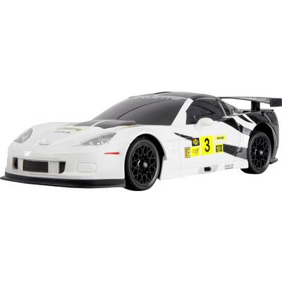 « Une voiture de course miniature blanche avec le numéro 3 sur le côté, arborant des bandes de course noires et des logos, conçue pour des performances à haute vitesse. »