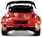 Une voiture miniature Citroën C3 WRC rouge, arborant des logos proéminents 'Abu Dhabi', Citroën et 'C3 WRC', équipée d'un grand aileron arrière.
