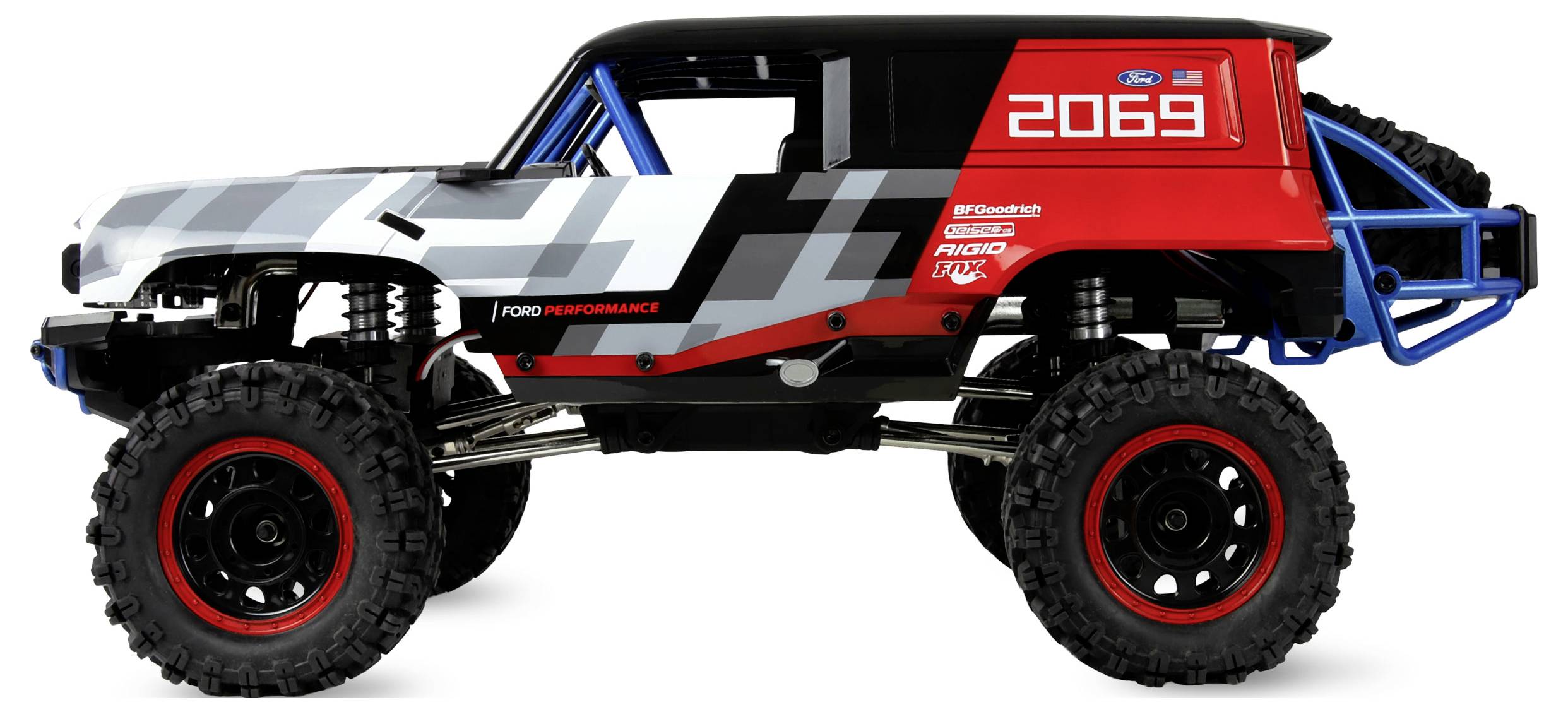 Camion télécommandé tout-terrain avec de grandes roues, carrosserie rouge et grise, affichant le numéro '2069' et des logos sur le côté.