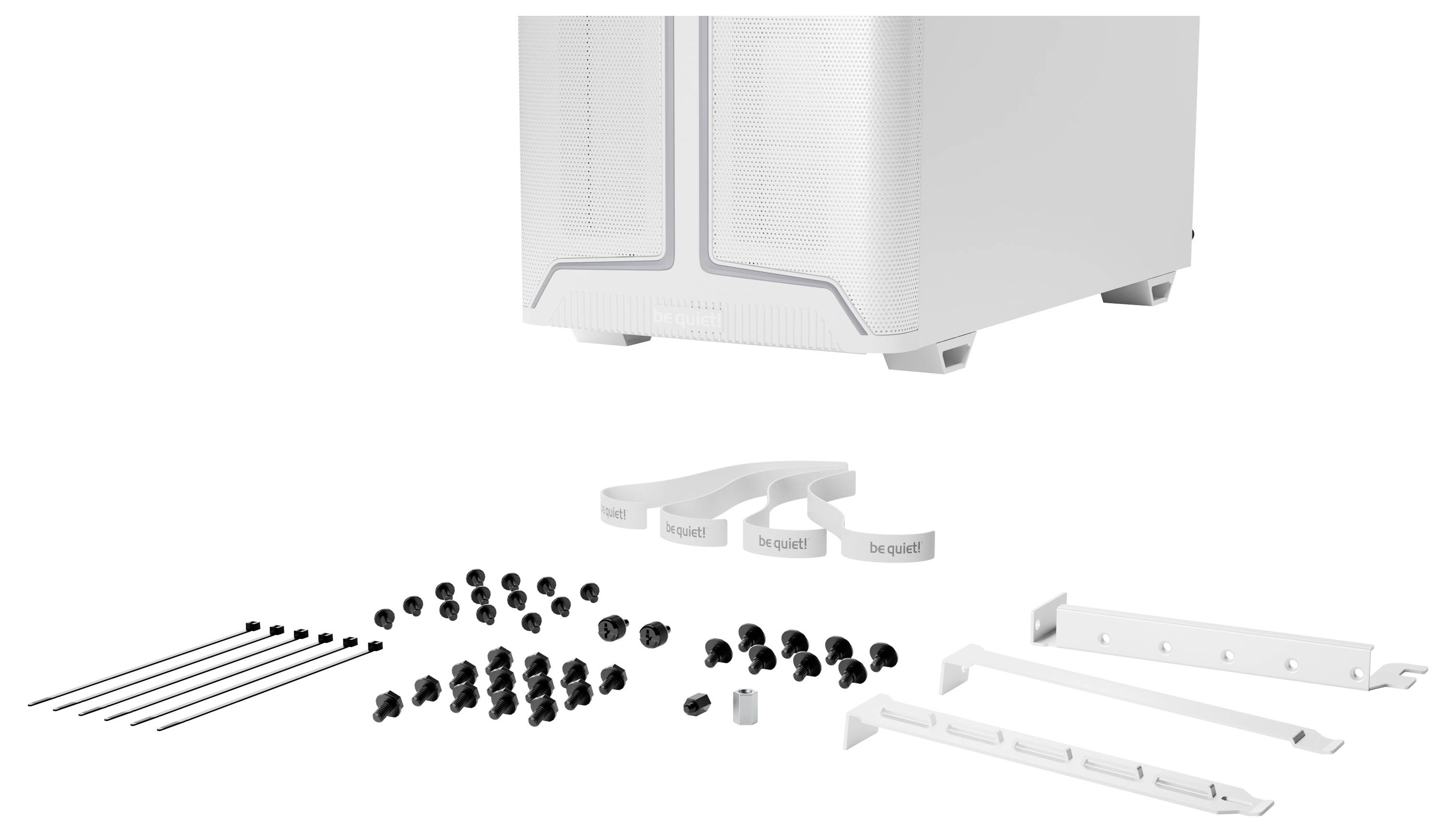 Boîtier d'ordinateur blanc avec des vis, des attaches de câbles et des supports disposés devant. Accessoires inclus pour l'assemblage et l'installation.