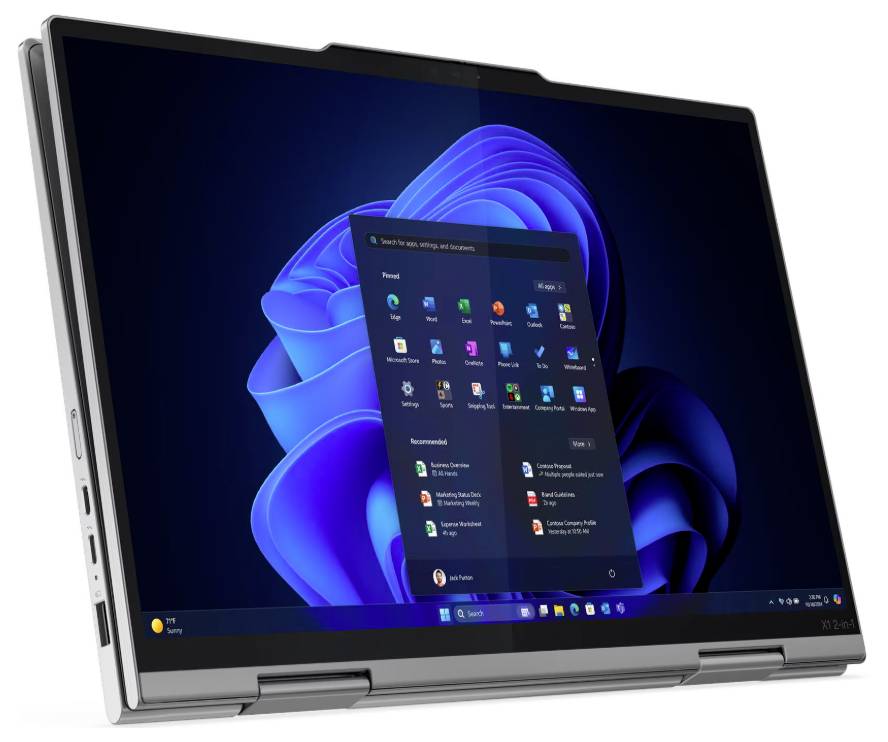 Un ordinateur portable en mode tablette affiche l'écran d'accueil de Windows 11 avec des applications. L'arrière-plan est un motif abstrait bleu.