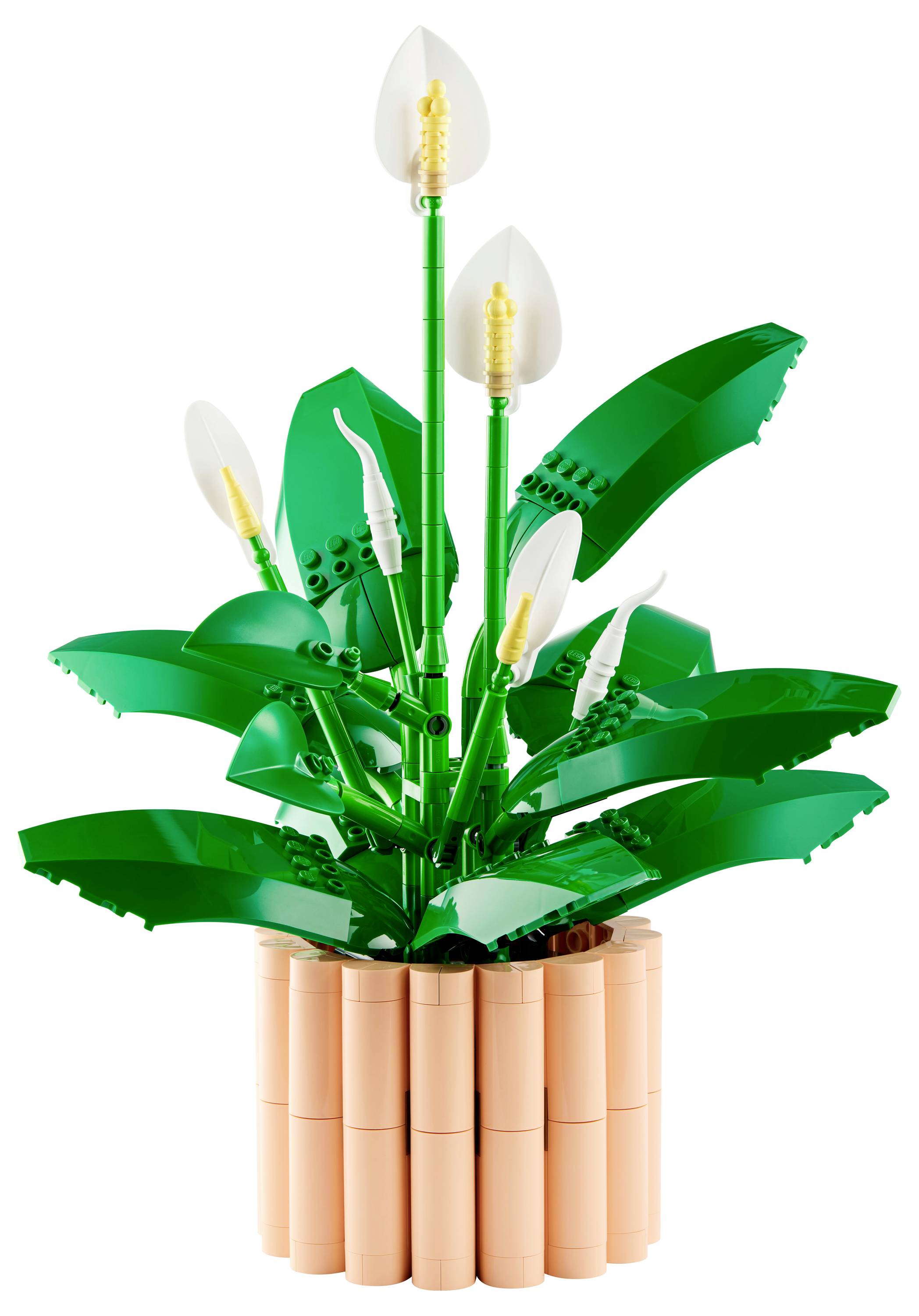 « Un modèle LEGO d'une plante de lys de la paix dans un pot construit en briques, avec des feuilles vertes et des fleurs blanches aux centres jaunes. »