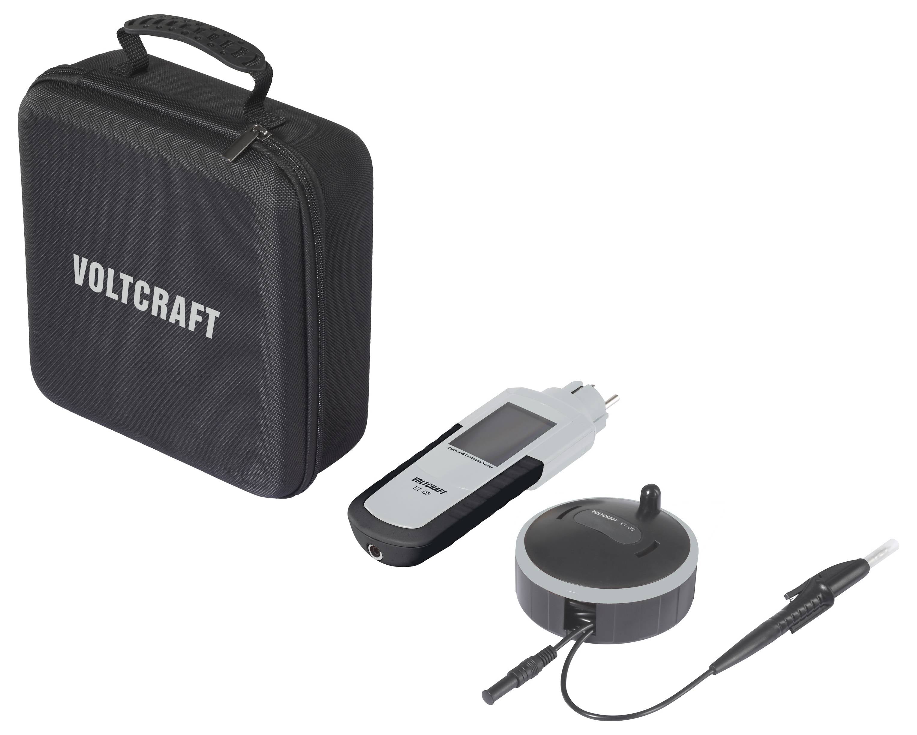 Un étui de transport de marque Voltcraft de couleur noire contenant un appareil de mesure numérique et une sonde de capteur, utilisé pour les tests électriques et les mesures.