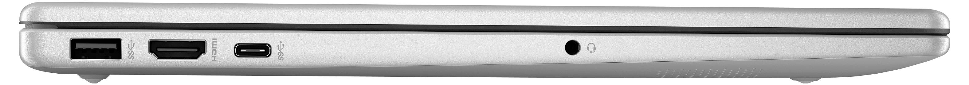 Un ordinateur portable argenté fermé montrant les ports USB, HDMI et pour casque sur le côté.