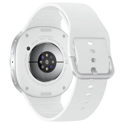 L'image montre la vue arrière d'une montre intelligente blanche avec un boîtier rond en métal, des capteurs au centre, et une sangle blanche ajustable.
