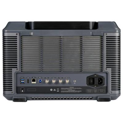 Vue arrière d'un appareil high-tech présentant plusieurs ports d'entrée/sortie, comprenant USB, Ethernet, coaxial et connexion d'alimentation, sur un boîtier gris.