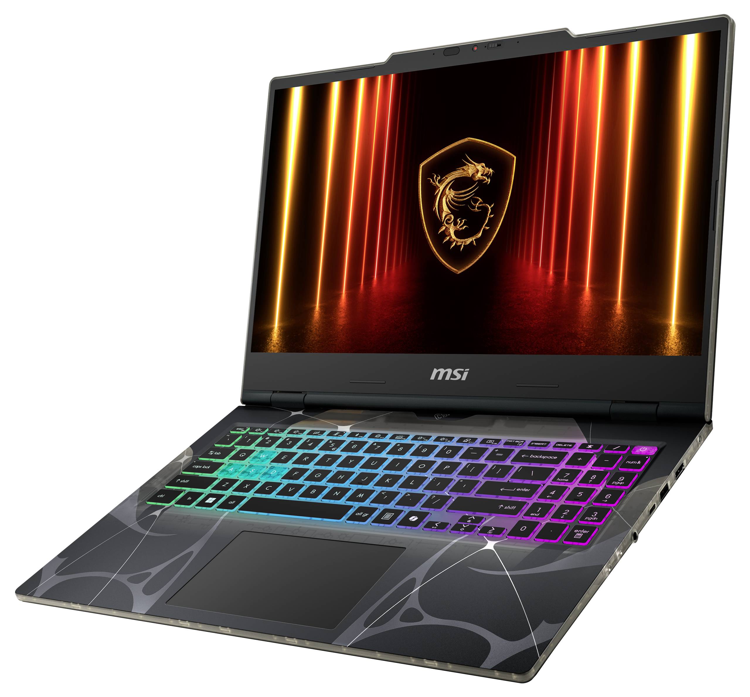 Un ordinateur portable de jeu avec un clavier rétroéclairé multicolore et un logo de dragon lumineux affiché sur l'écran, sur un fond sombre.