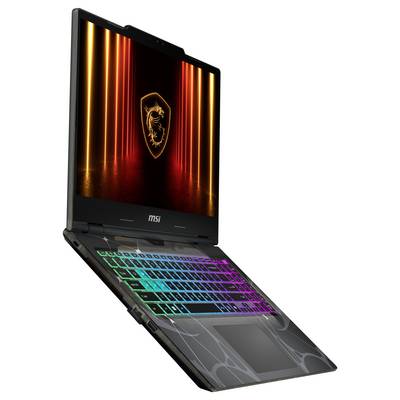 Un ordinateur portable de jeu avec un clavier rétroéclairé, affichant le logo MSI sur son écran.